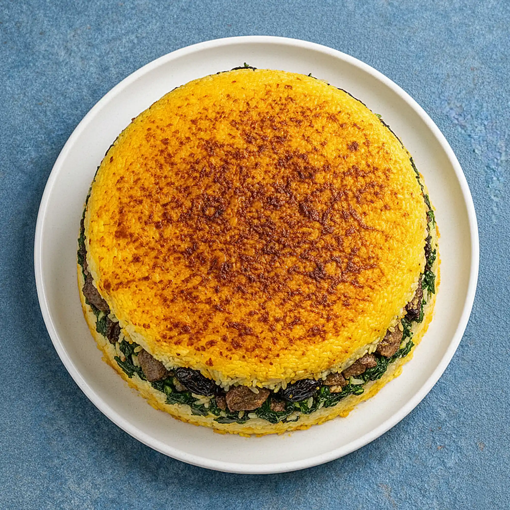 تهچین اسفناج و آلو